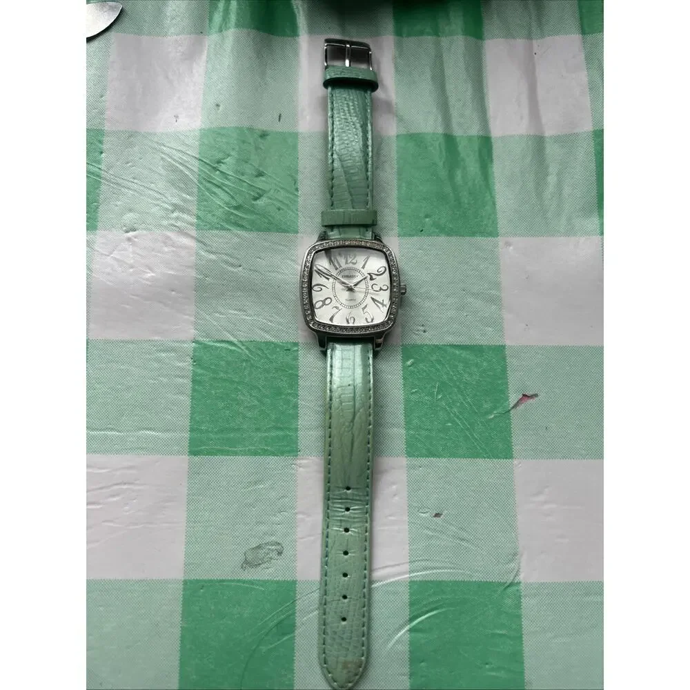 Embassy silver tone